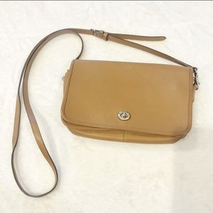 Coach orange-lined purse in tan brown